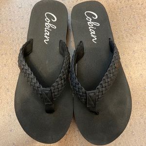 Cobian black flip flops